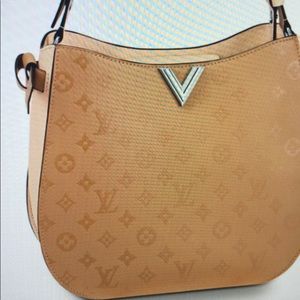 Brand new Louis Vuitton, used once.